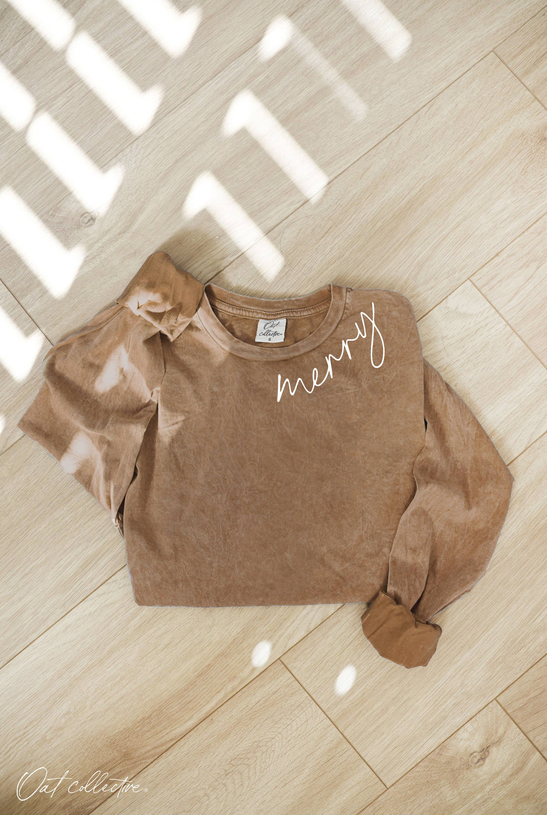 MERRY mineral washed long sleeve graphic tee in relaxed boho coastal style