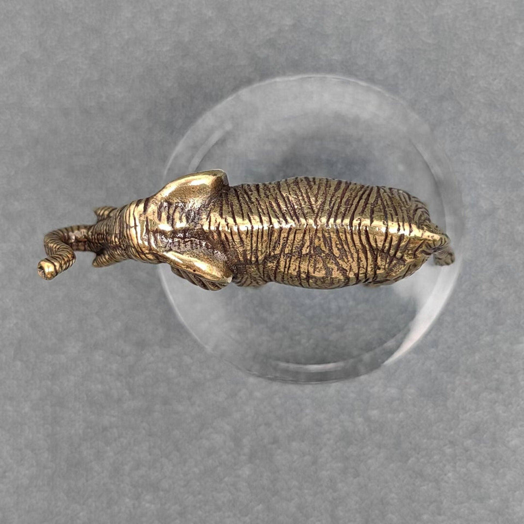 Brass elephant desktop ornament bringing good luck charm energy to boho spiritual decor