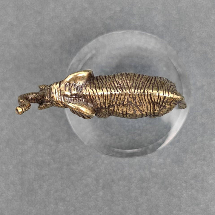 Brass elephant desktop ornament bringing good luck charm energy to boho spiritual decor