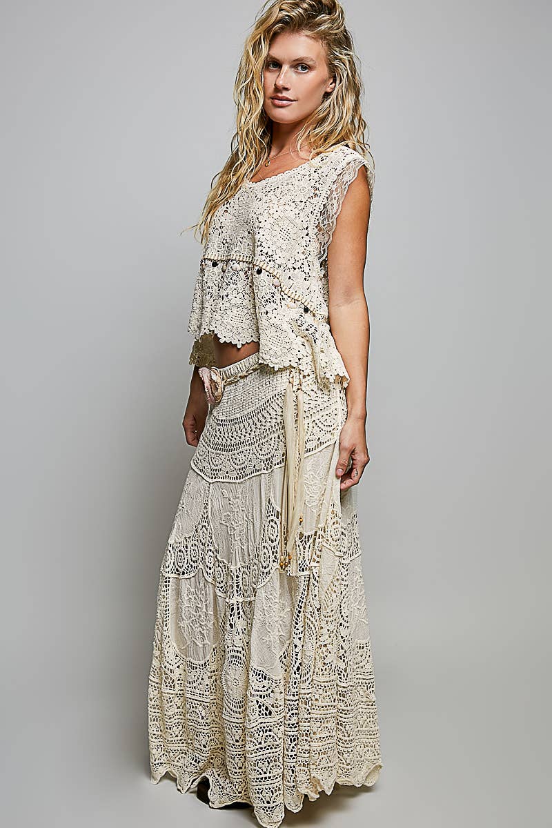 Handcrafted crochet embroidered maxi skirt in earthy tones for boho coastal style