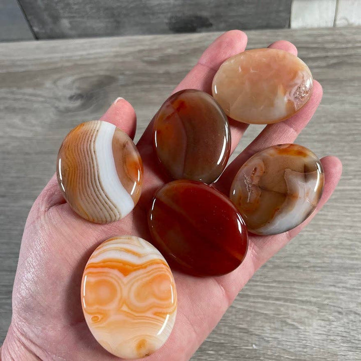 Smooth gemstone palm stones 45mm for grounding meditation and coastal healing rituals