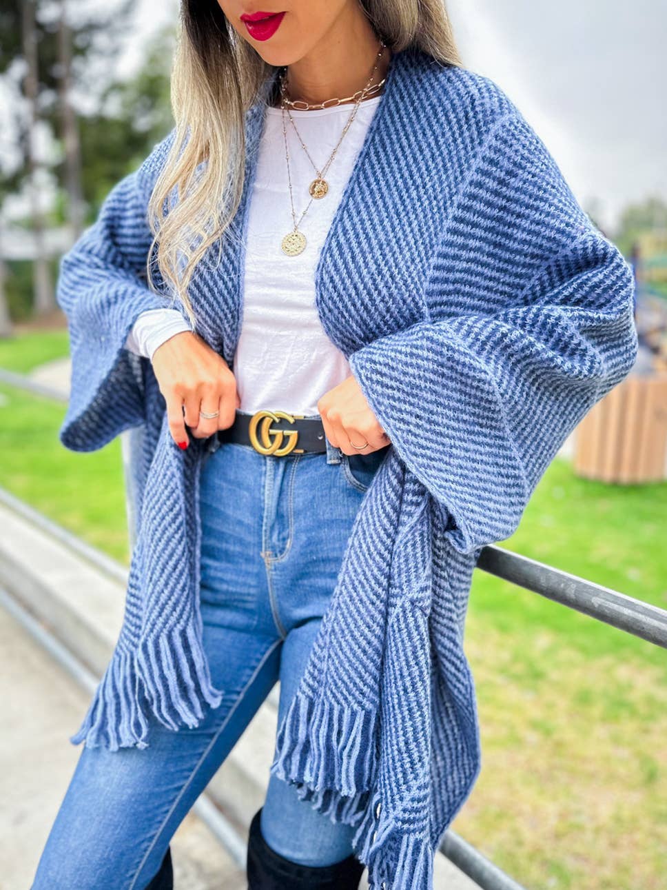 Navy chevron knitted ruana cardigan with tassel and pocket for coastal bohemian style