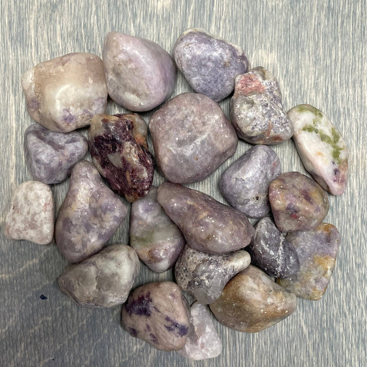 Lepidolite Tumbled Stones bulk lot glowing with soft lavender calming crystal energy