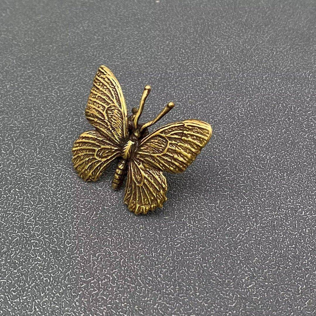 Vintage brass butterfly desktop ornaments symbolizing transformation for a sacred intentional space