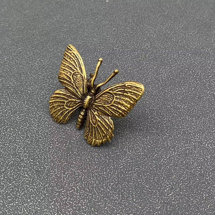 Vintage brass butterfly desktop ornaments symbolizing transformation for a sacred intentional space