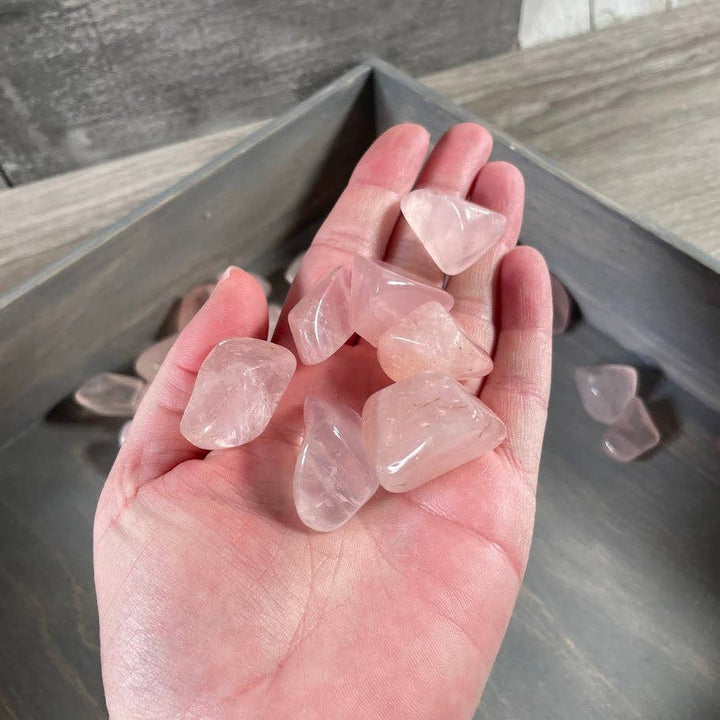 Rose Quartz Tumbled Stones bulk lot glowing with warm heart chakra energy