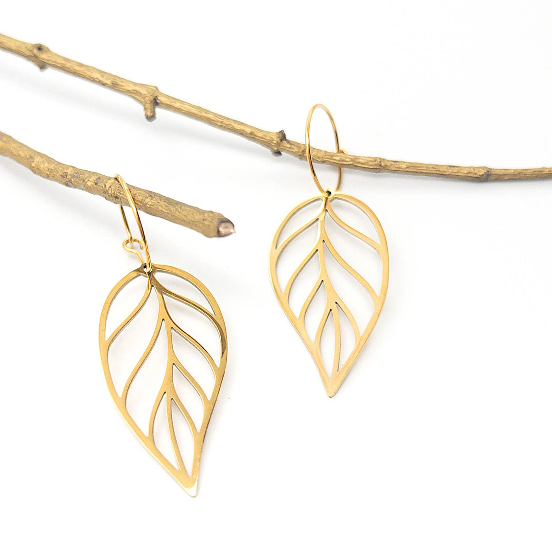 Gold leaf drop earrings with hoop detail featuring durable PVD gold plating