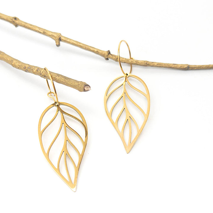 Gold leaf drop earrings with hoop detail featuring durable PVD gold plating