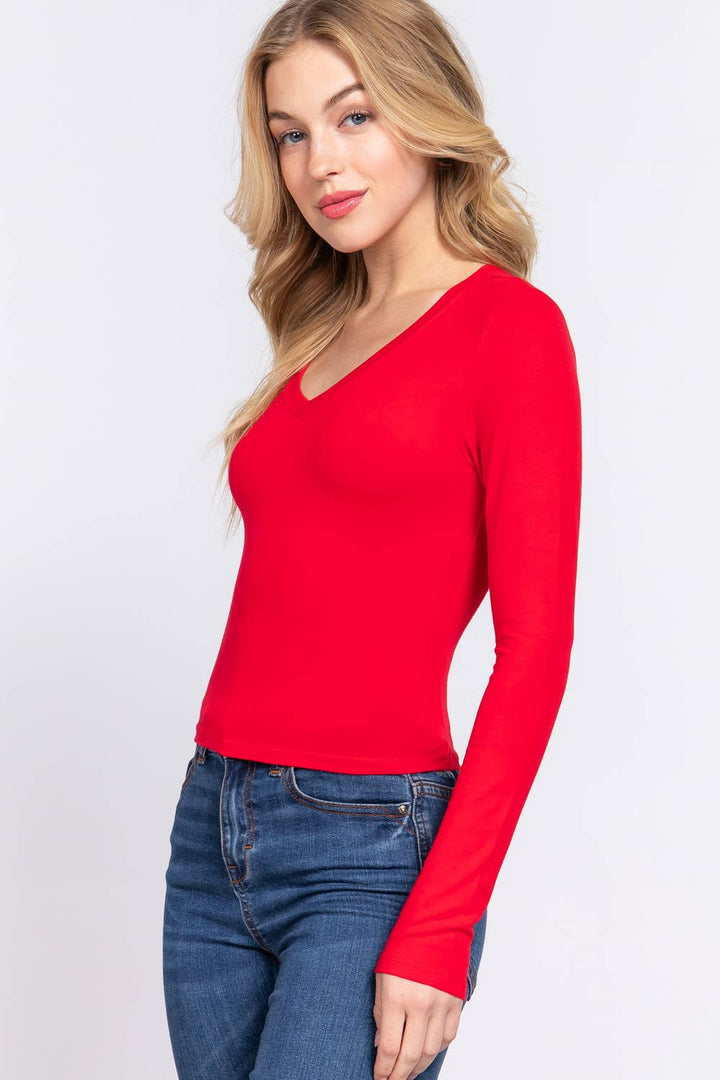 Fitted long sleeve V-neck crop top perfect for coastal boho layering and beachside style