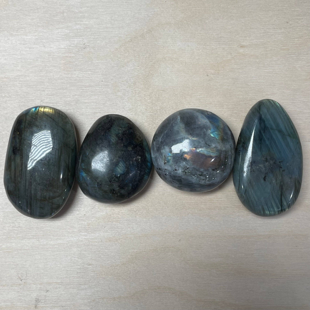 Natural Labradorite Palm Stone for crystal healing, intuition, and coastal spiritual wellness