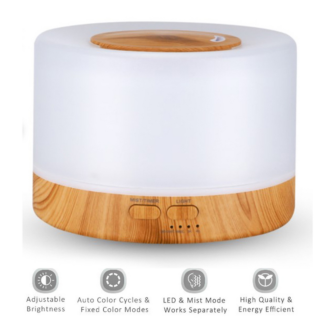 Ultrasonic Home Diffuser 700ml Wood White glowing softly in a coastal wellness space