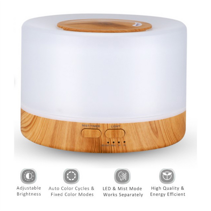 Ultrasonic Home Diffuser 700ml Wood White glowing softly in a coastal wellness space
