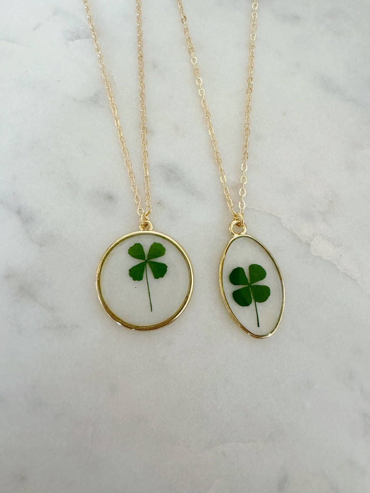 Four Leaf Clover Pressed Flower Necklace in 14k gold filled handcrafted boho style