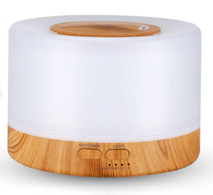 Ultrasonic Home Diffuser 700ml Wood White glowing softly for coastal wellness rituals
