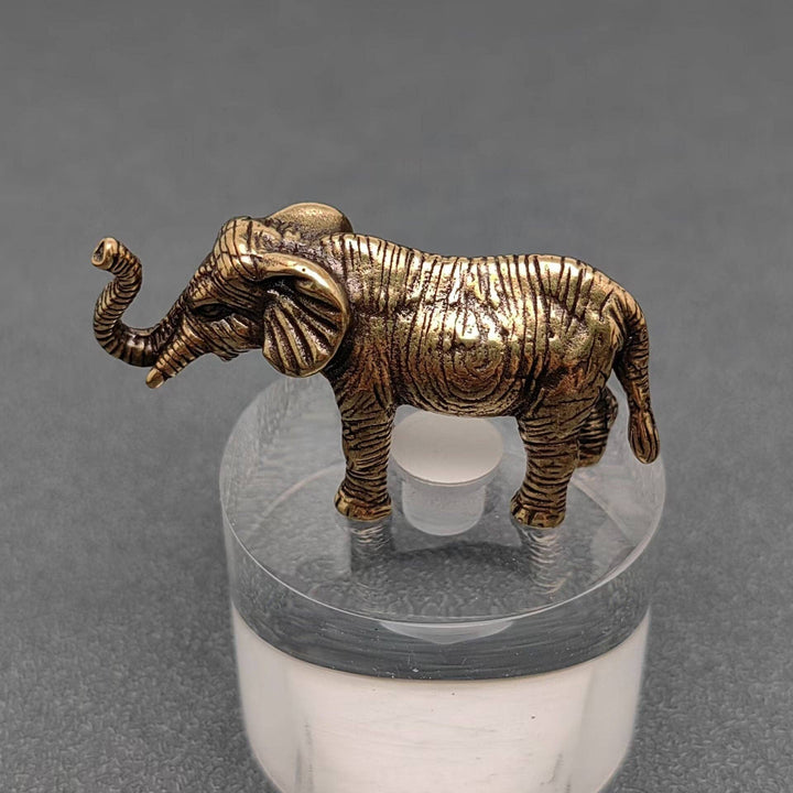 Brass elephant desktop ornament bringing good luck charm energy to boho home decor