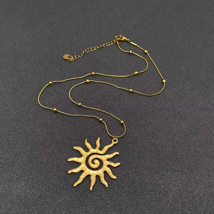 18K gold plated stainless steel vortex sun charm necklace for coastal boho souls