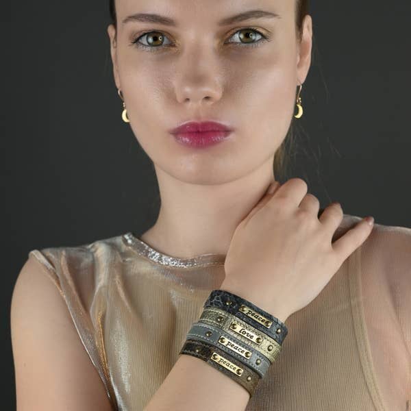 Black leather stacker cuff with brass plaque engraved Where Theres a Will Theres a Way