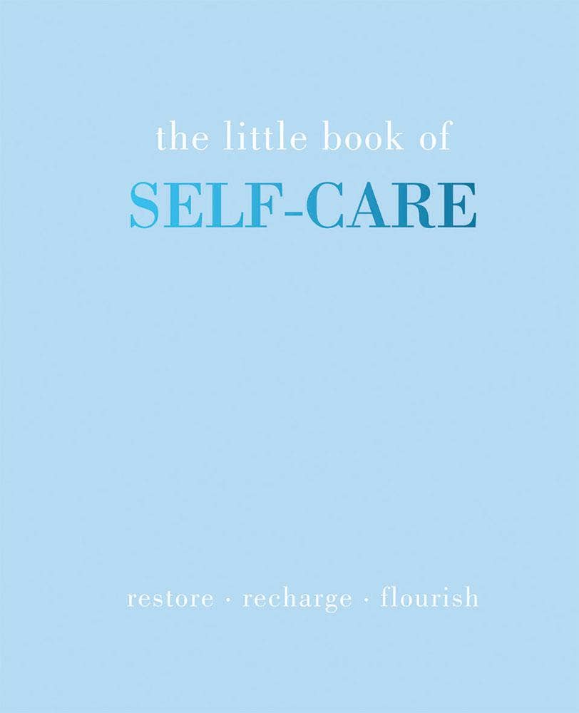 The Little Book of Self-Care beside coastal wellness gifts at Anchored Soul Boutique
