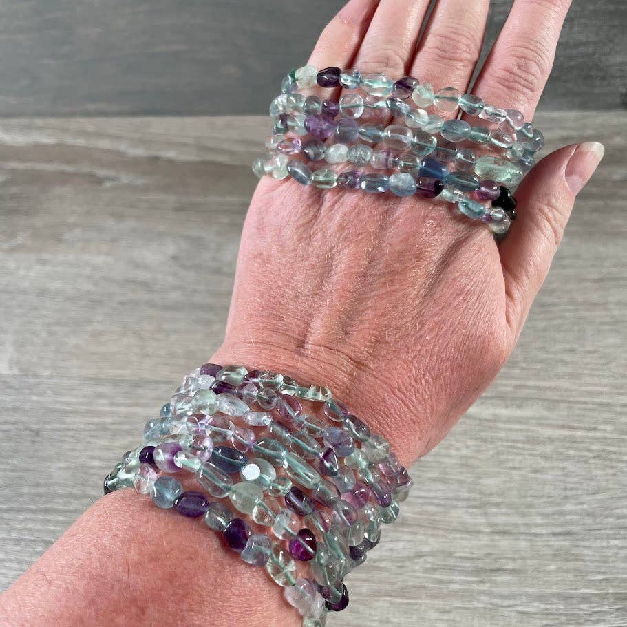 Healing crystal bracelets featuring natural nugget gemstones for boho spiritual layering