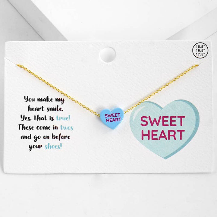Gold Dipped Heart Candy Necklace layered with coastal charm and bohemian warmth