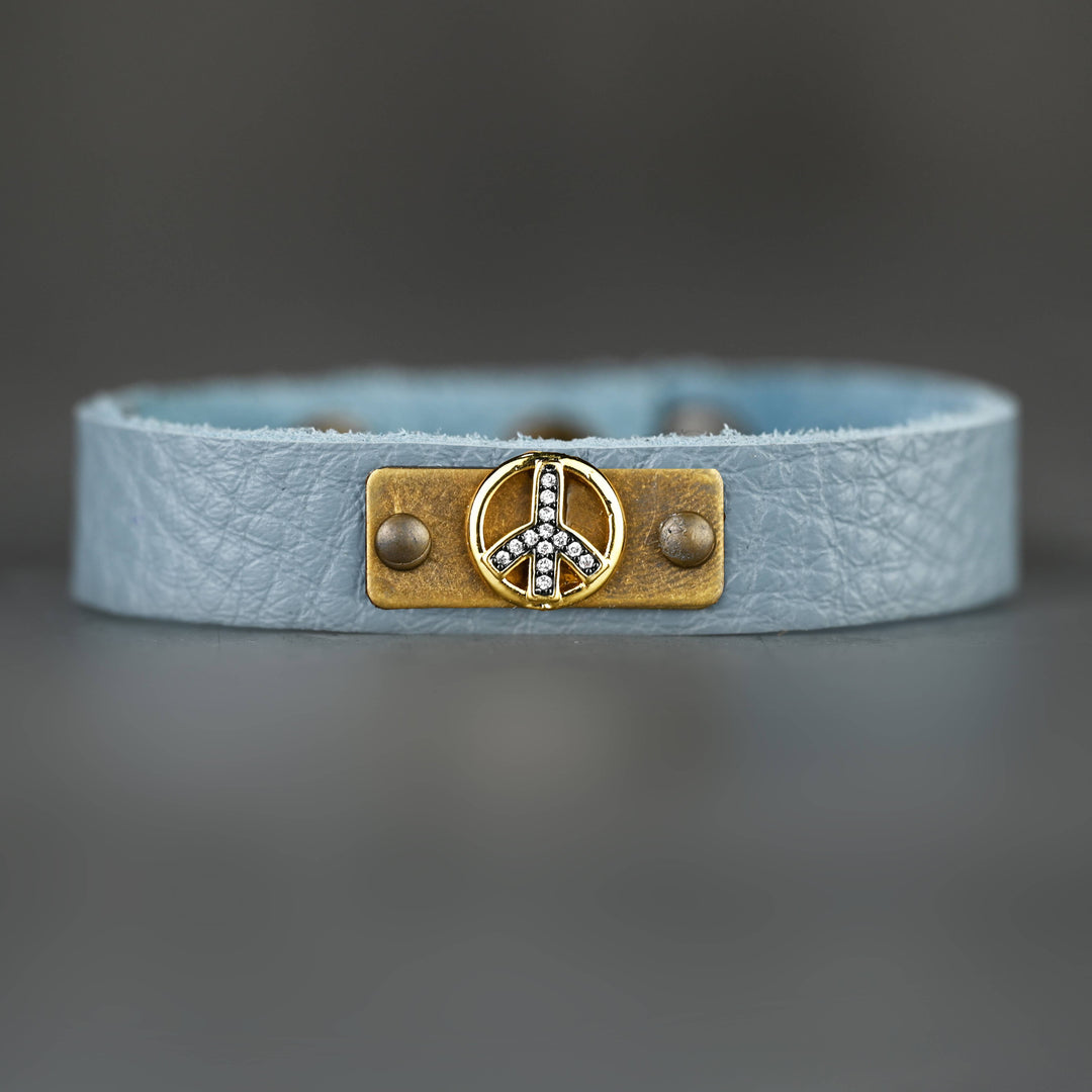 Turquoise leather stacker cuff with pavé peace charm handcrafted boho coastal bracelet