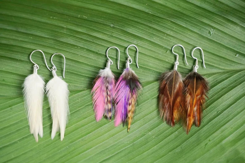 Handmade Bali feather earrings in brown white and pink boho coastal style