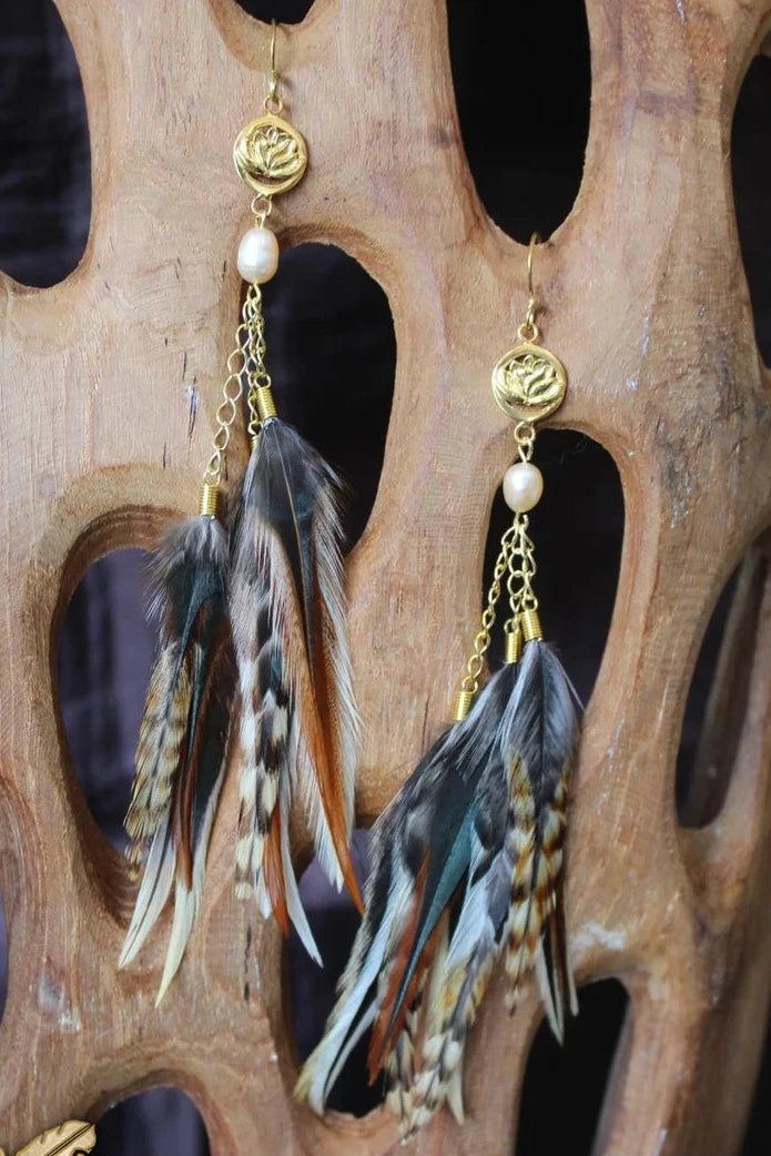 Handmade Bali feather earrings with lotus design in earthy brown and green tones