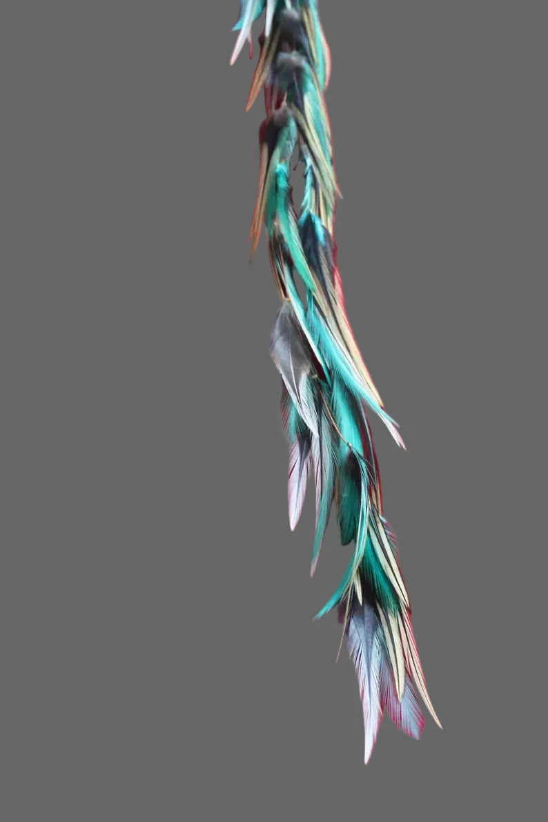 Handmade Bali feather hair clip in brown purple and green boho coastal style