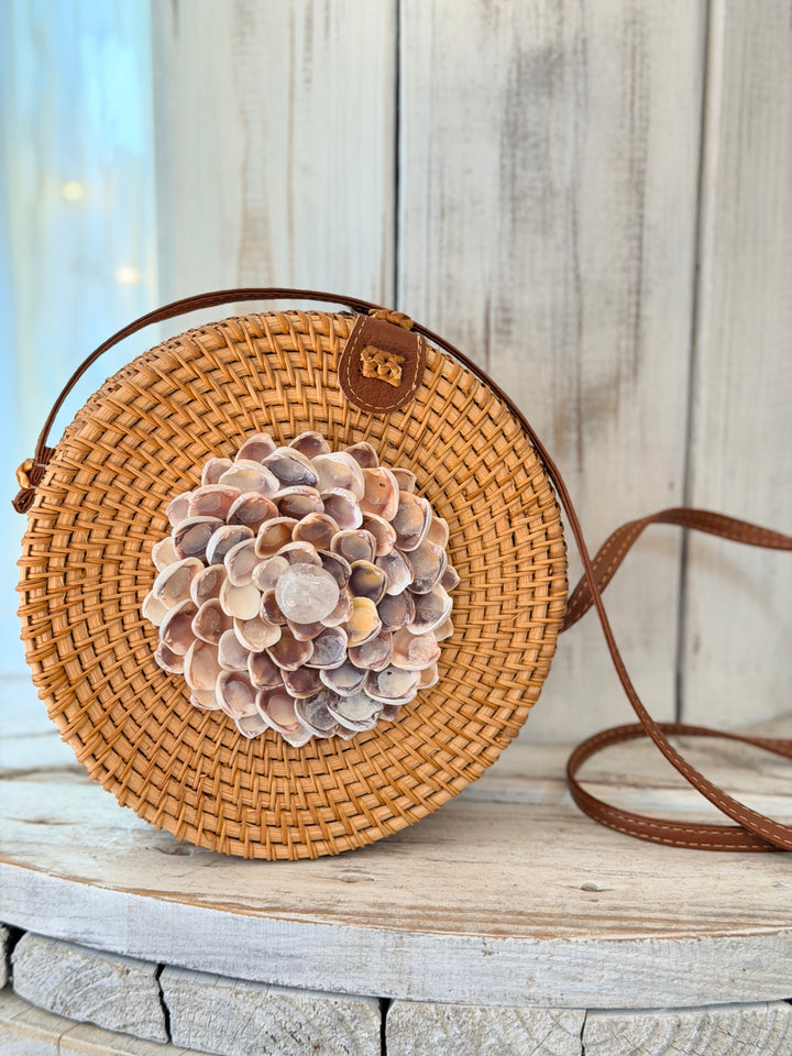 ZenFlower tan rattan bag adorned with clear quartz and seashell flower art