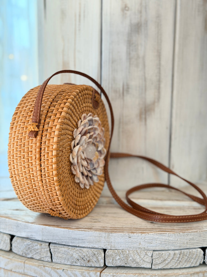 ZenFlower tan rattan bag adorned with clear quartz and seashell flower art