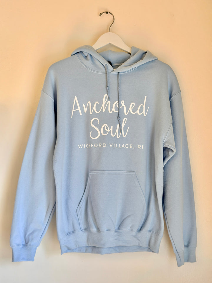 Light blue Anchored Soul hoodie with anchor graphic, coastal boho style, Wickford RI