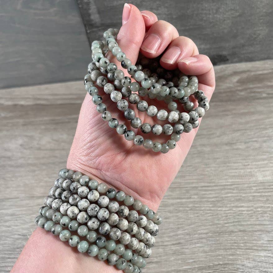 Healing crystal bracelet with 6mm round gemstone beads for coastal boho style