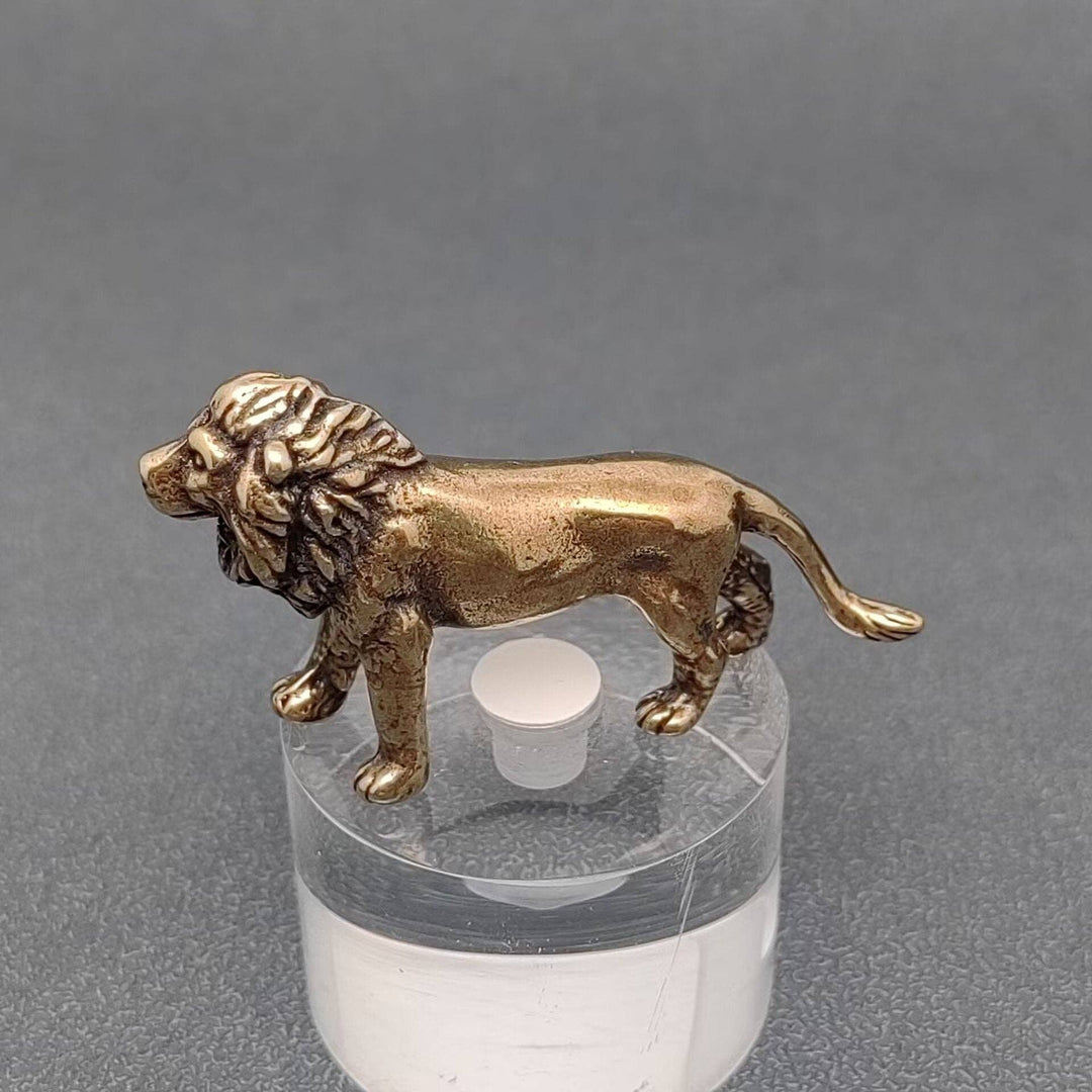 Brass lion desktop ornament radiating courage and grounded boho energy for soulful spaces