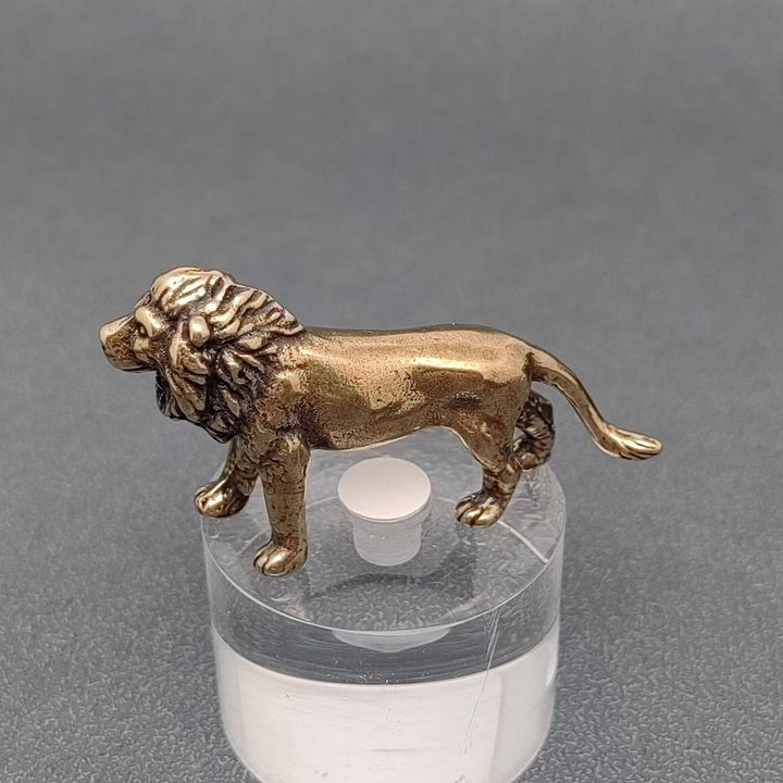 Brass lion desktop ornament radiating courage and grounded boho energy for soulful spaces
