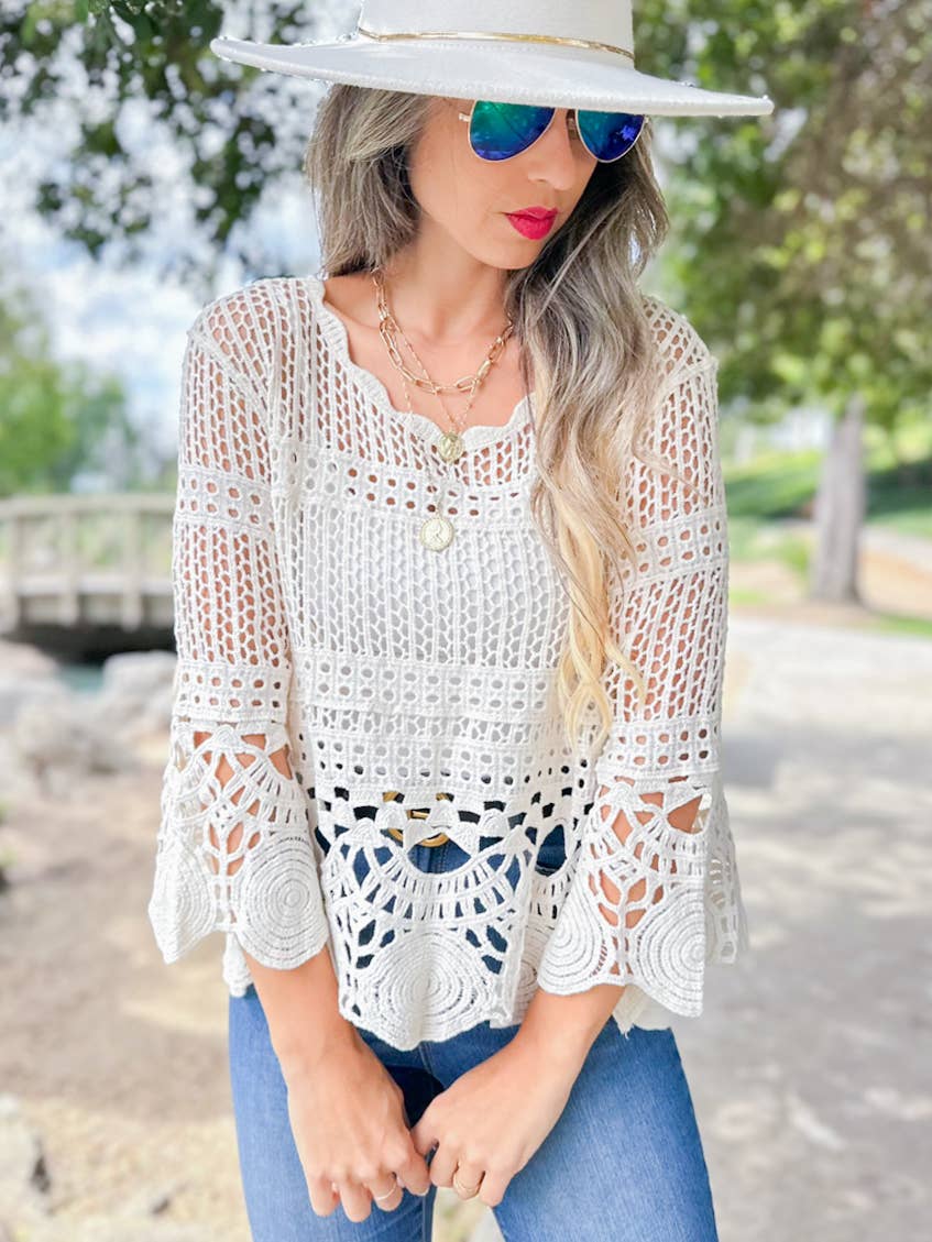 Boho scalloped round neck crochet top with open knit three-quarter sleeves coastal style
