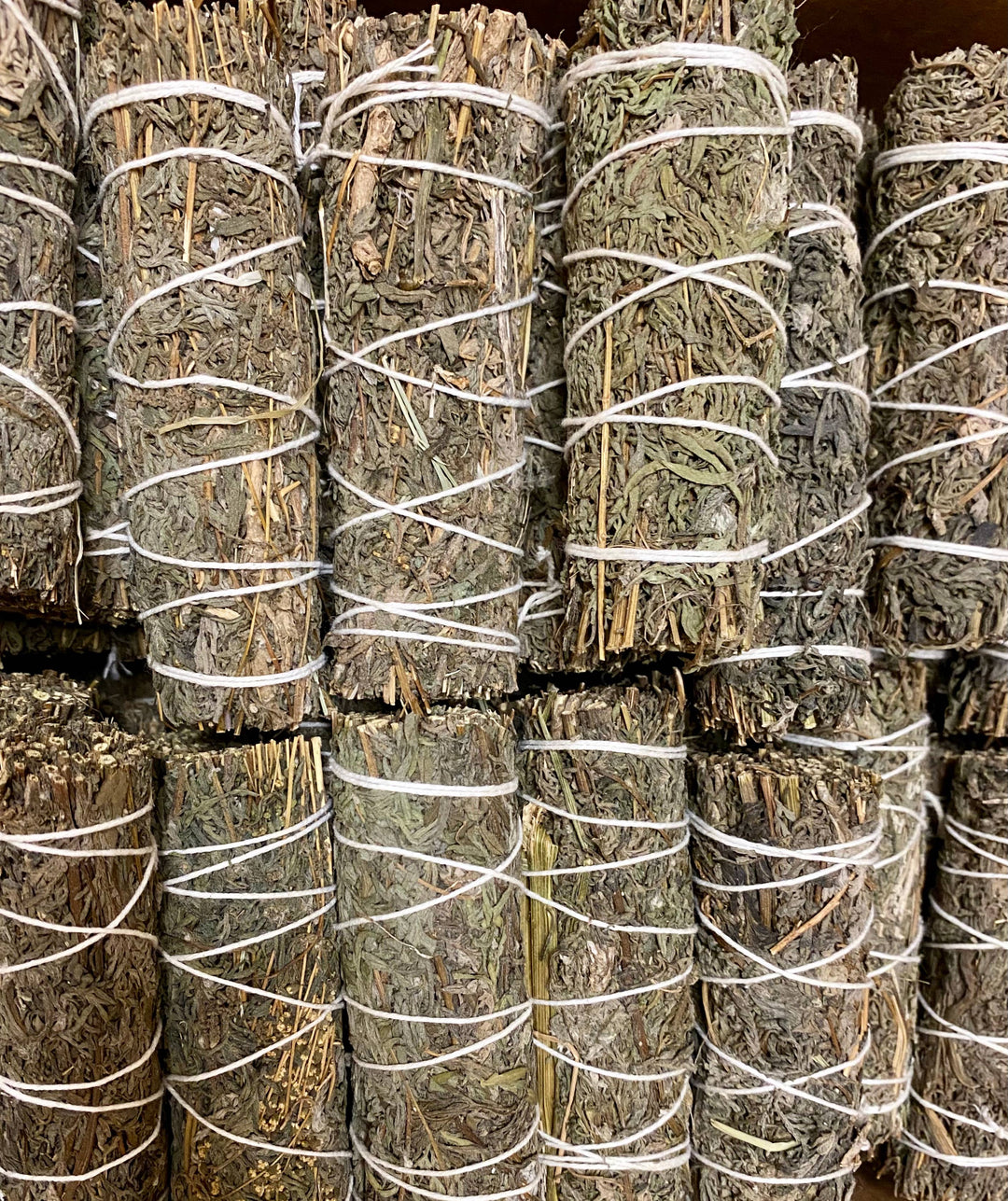Handcrafted mugwort bundles for smoke cleansing dreamwork and spiritual healing rituals