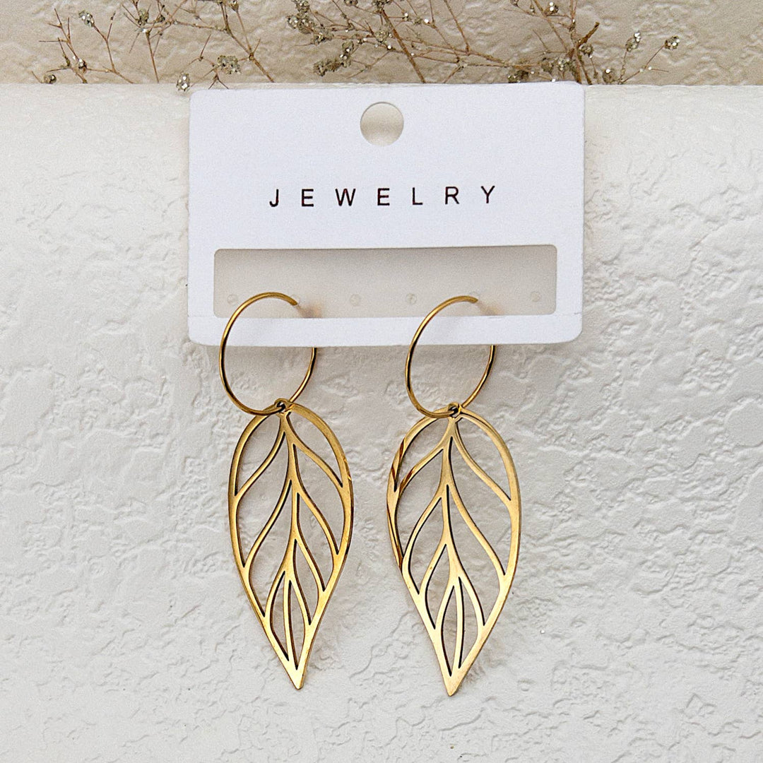Gold leaf drop earrings with hoop design featuring warm PVD plating finish