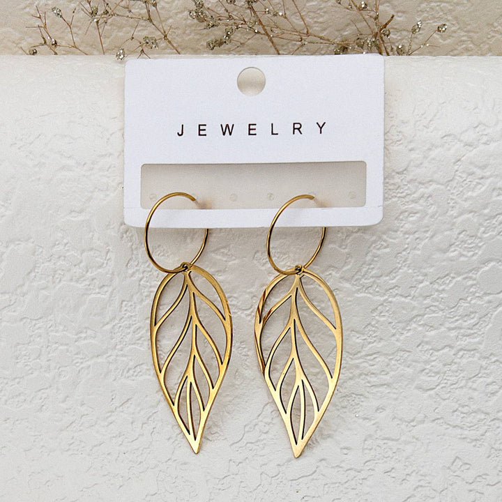 Gold leaf drop earrings with hoop design featuring warm PVD plating finish