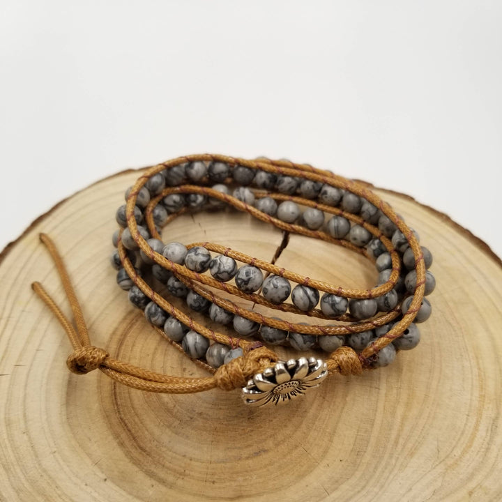 Handmade multi-layer natural stone leather bracelet with earthy chakra energy and artisan charm