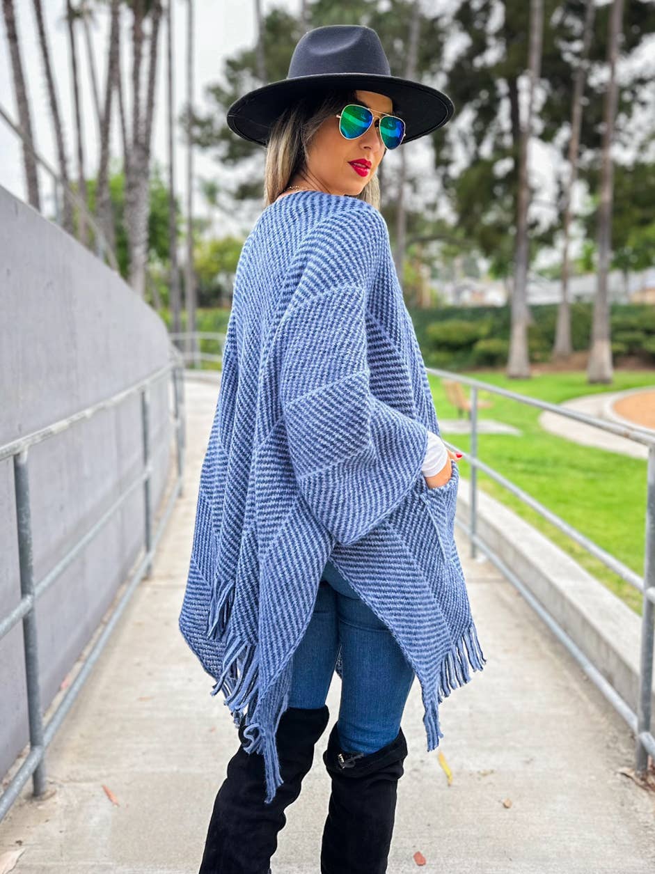 Navy chevron knitted ruana cardigan with tassel and pocket for coastal bohemian style