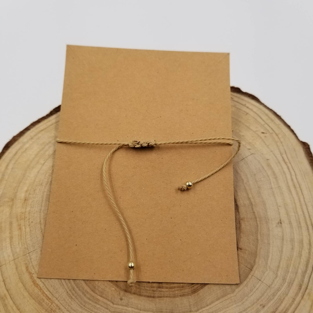 Natural stone handwoven Taurus constellation bracelet with card from Anchored Soul boutique