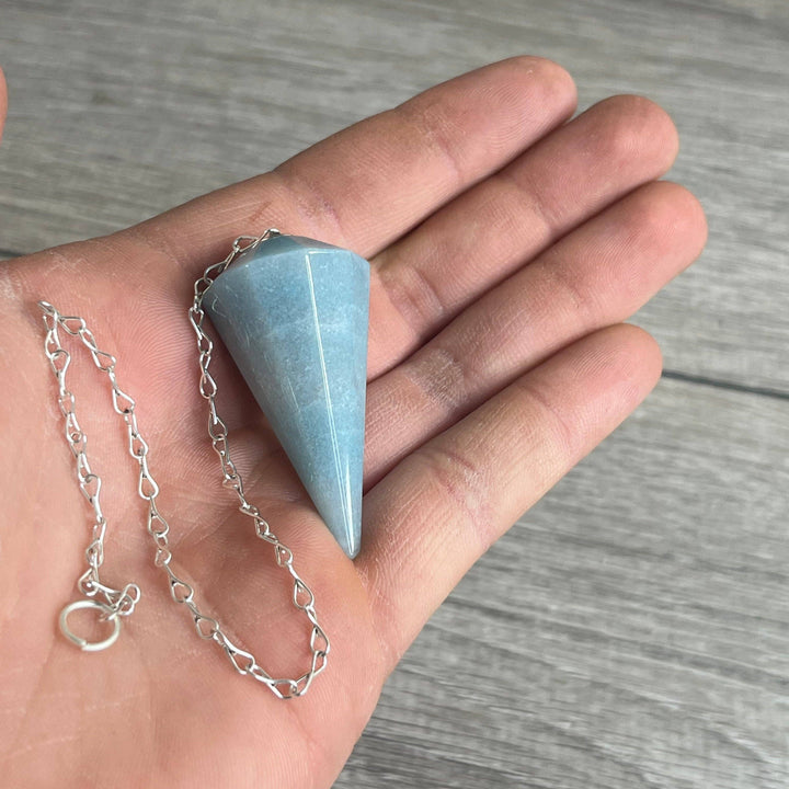 Natural gemstone pendulums for divination and healing rituals at Anchored Soul boutique