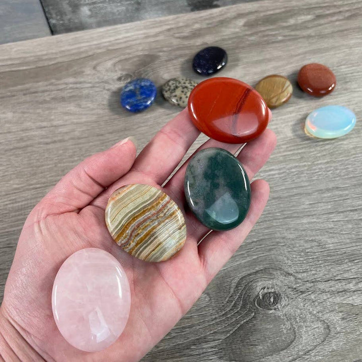 Smooth gemstone palm stones 45mm for grounding meditation and coastal wellness rituals
