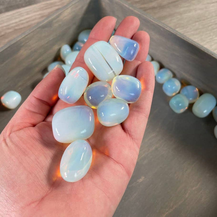 Opalite tumbled stones bulk lot glowing with soft iridescent coastal healing energy