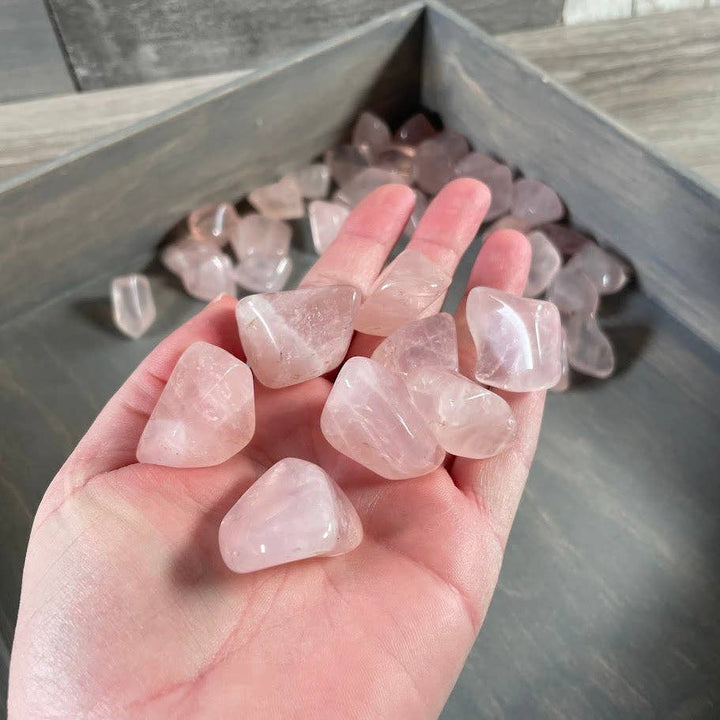 Rose Quartz Tumbled Stones bulk lot glowing with gentle heart chakra healing energy