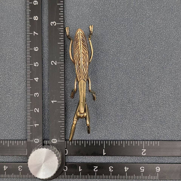 Brass Mantis Desktop Ornament bringing good luck charm to boho coastal decor