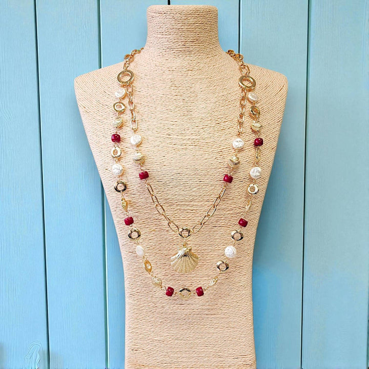 Handmade seashell and chain necklace inspired by coastal boho style from Anchored Soul