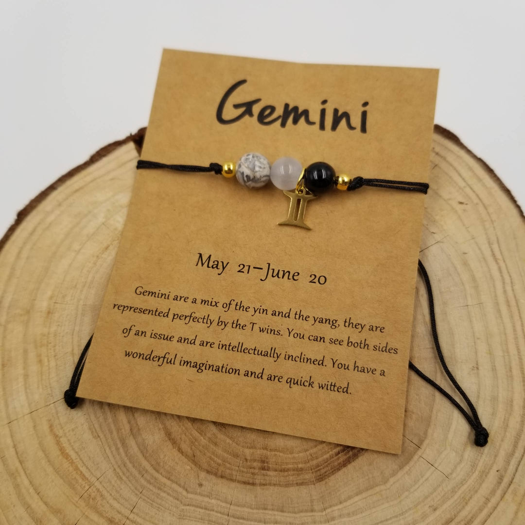 Chakra Zodiac Bracelet with charm and card featuring constellation and healing crystal energy